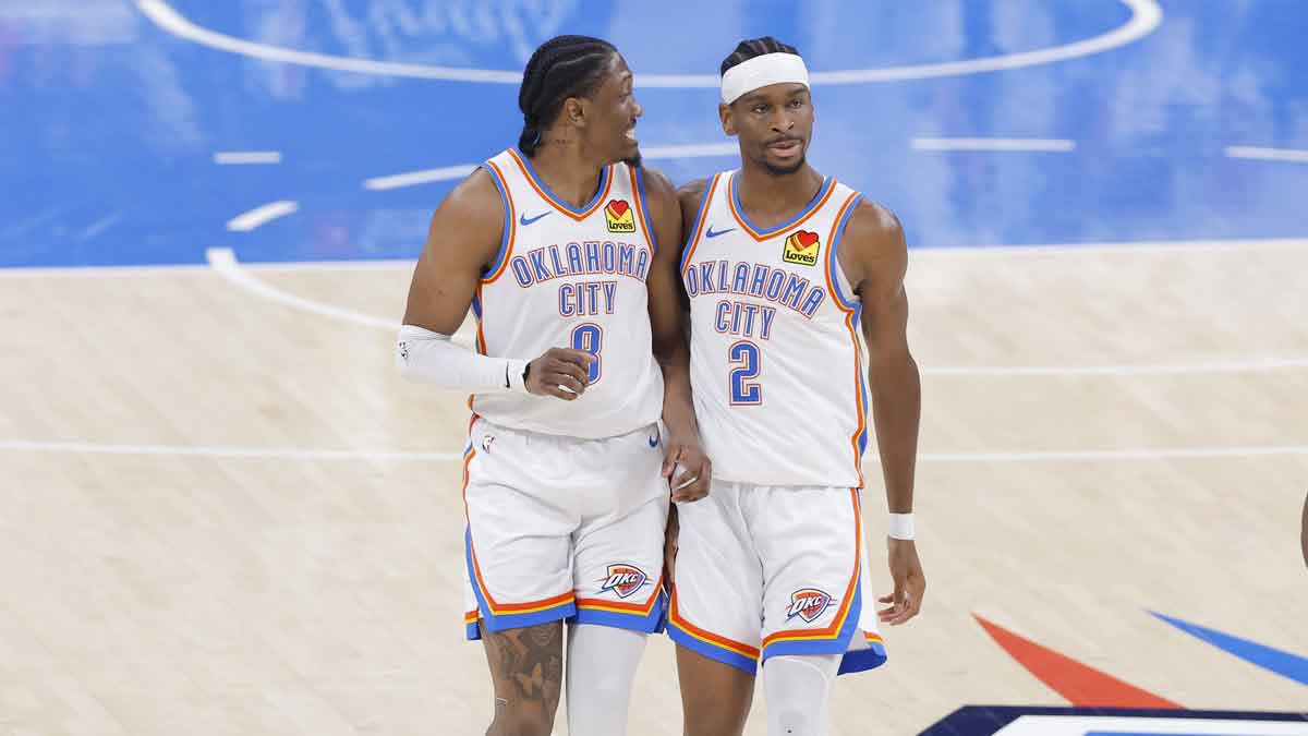 Thunder forward Jalen Williams (8) and guard Shai Gilgeous-Alexander (2) walk