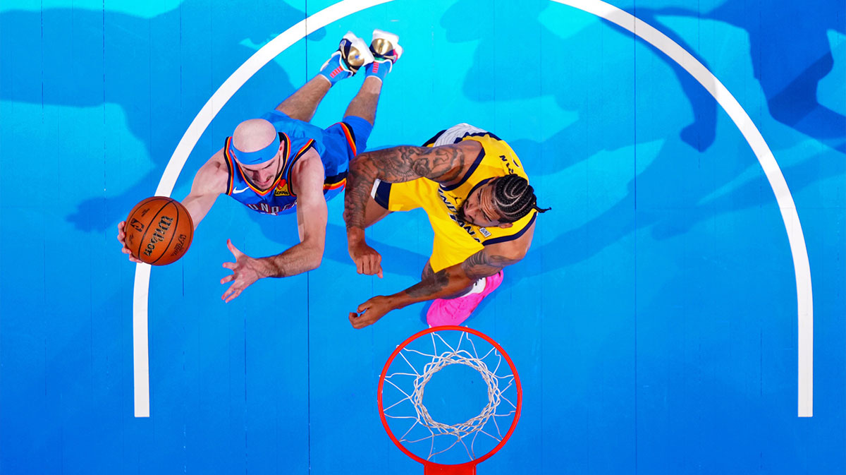 Oklahoma City Thunder guard Alex Caruso (9) shoots the ball against Indiana Pacers forward Obi Toppin (1) during the second half during game two of the 2025 NBA Finals at Paycom Center.