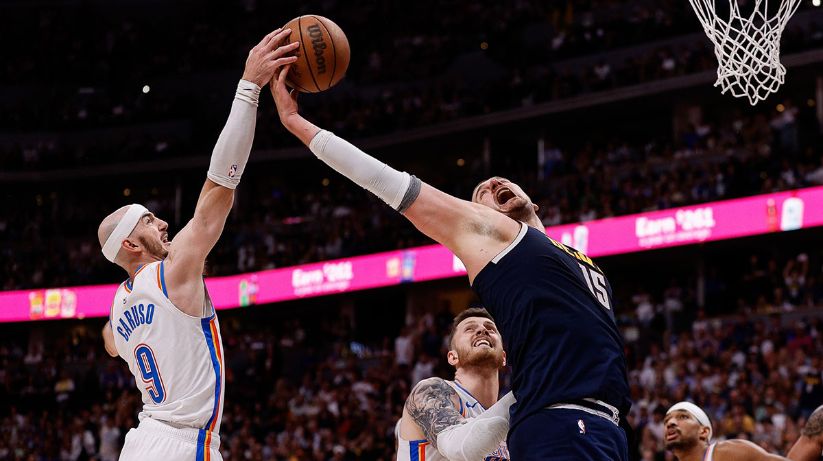 Thunder guard Alex Caruso (9) and Denver Nuggets center Nikola Jokic (15) battle for a rebound as center Isaiah Hartenstein (55) defends in the fourth quarter during game four of the second round of the 2025 NBA Playoffs at Ball Arena