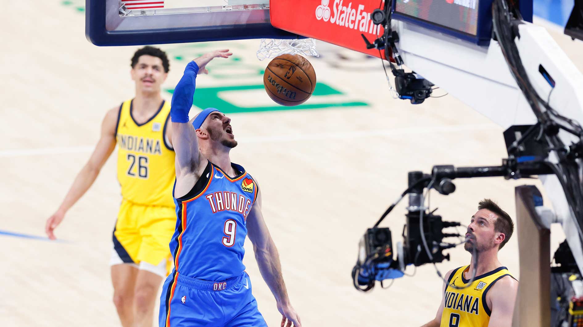 Thunder guard Alex Caruso (9) shoots a lay-up against the Indiana Pacers during the first half of game seven of the 2025 NBA Finals at Paycom Center