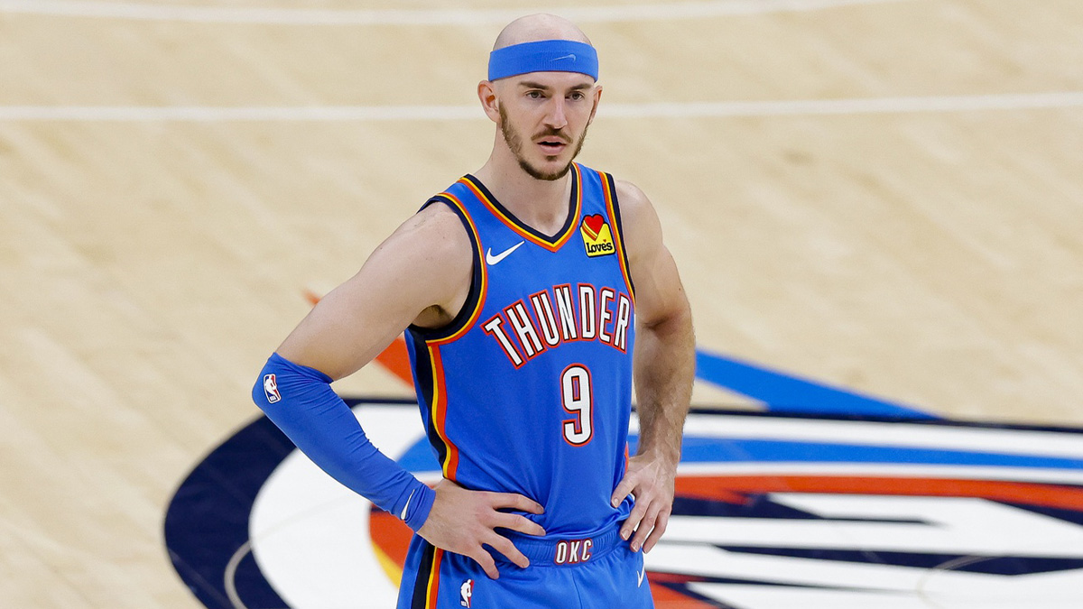 Thunder guard Alex Caruso (9) looks on during the third quarter against the Indiana Pacers in game two of the 2025 NBA Finals at Paycom Center with Draymond Green and Thunder's Chet Holmgren in the background