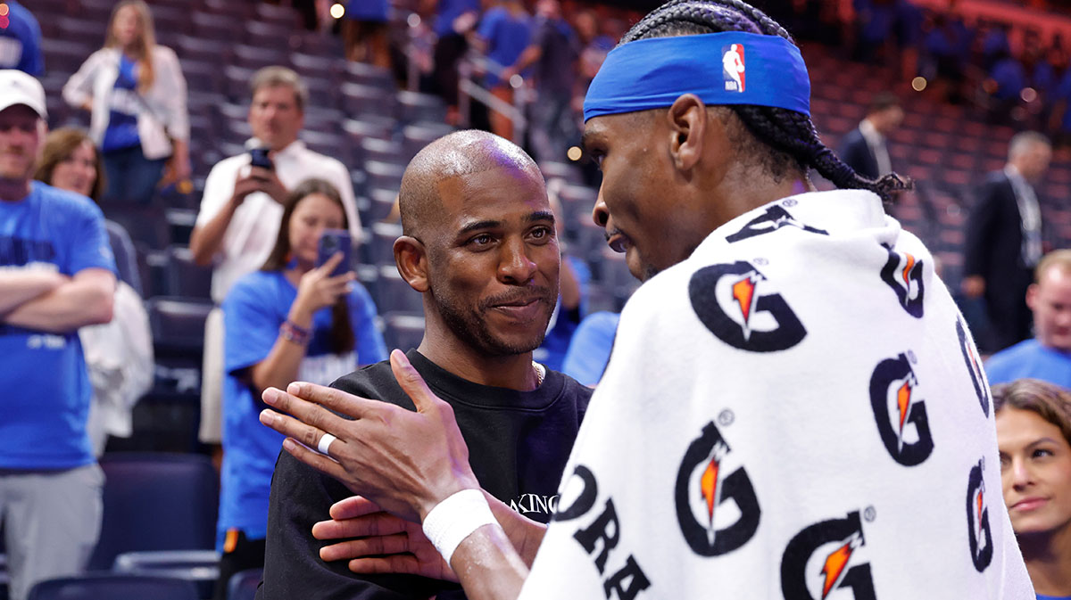 Oklahoma City Thunder guard Shai Gilgeous-Alexander (2) talks to Chris Paul after defeating the Minnesota Timberwolves during game two of the western conference finals for the 2025 NBA Playoffs at Paycom Center.