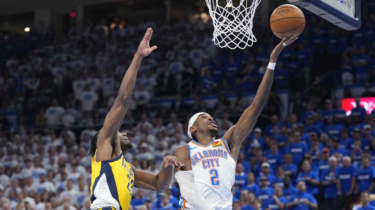 Thunder guard Shai Gilgeous-Alexander lays up the ball