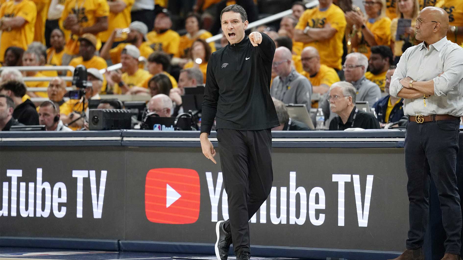 Oklahoma City Thunder head coach Mark Daigneault directs players against the Indiana Pacers during the first half of game six of the 2025 NBA Finals between the Oklahoma City Thunder and the Indiana Pacers at Gainbridge Fieldhouse.