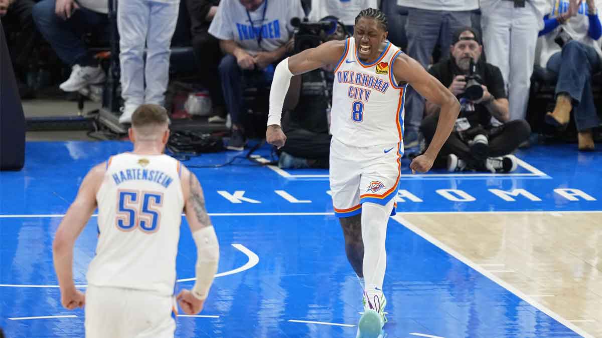 Thunder forward Jalen Williams (8) and center Isaiah Hartenstein (55) react after a play against the Indiana Pacers during the fourth quarter in game one of the 2025 NBA Finals at Paycom Center