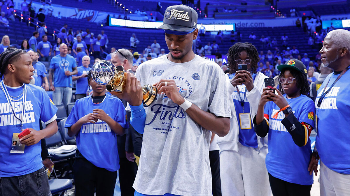 Oklahoma City Thunder guard Shai Gilgeous-Alexander (2) looks at his western conference finals MVP trophy after his team defeated the Minnesota Timberwolves in the western conference finals at Paycom Center.