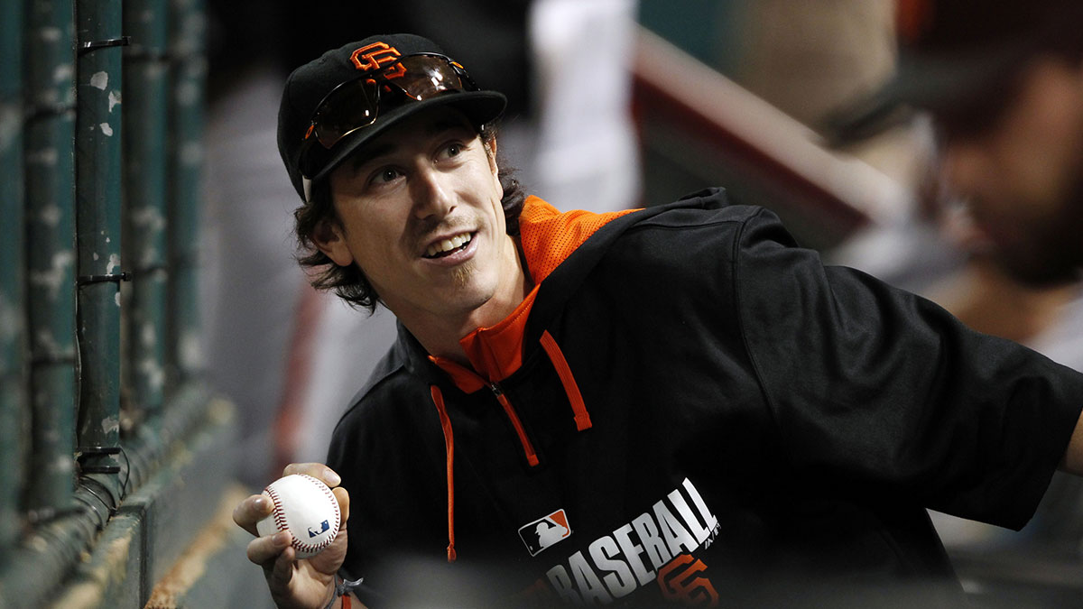 Jun 4, 2014; Cincinnati, OH, USA; San Francisco Giants starting pitcher Tim Lincecum (55) in the dugout during the eighth inning against the Cincinnati Reds at Great American Ball Park. The Giants defeated the Reds 3-2. Mandatory Credit: Frank Victores-Imagn Images