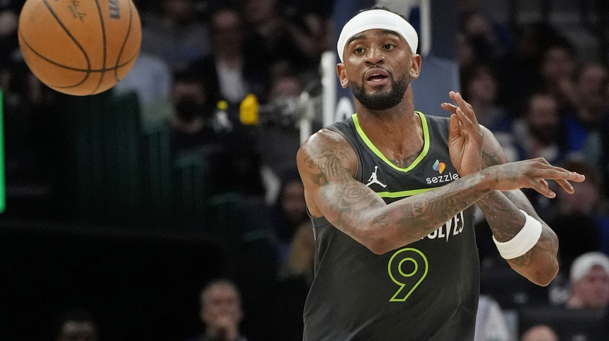 Minnesota Timberwolves forward Nickeil Alexander-Walker (9) passes the ball up court against the Orlando Magic in the second quarter at Target Center.