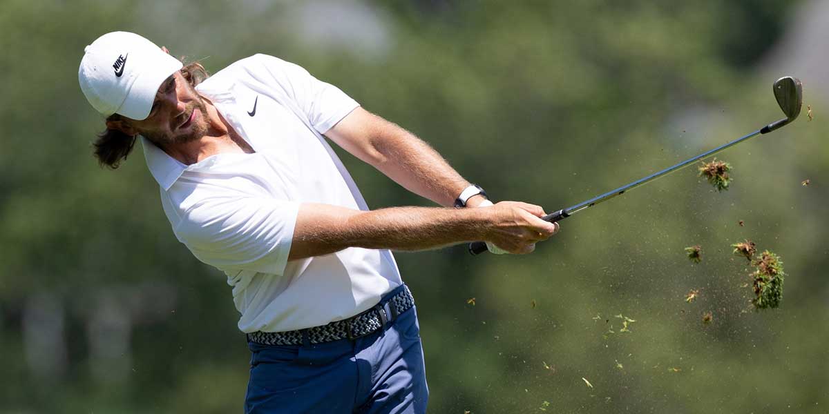 Tommy Fleetwood plays a shot on the second hole during the final round of the Travelers Championship golf tournament.
