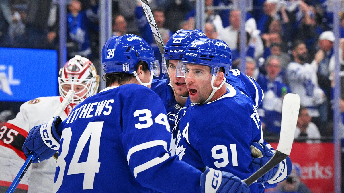 Toronto Maple Leafs forward John Tavares (91) celebrates with forwards Auston Matthews (34) and Matthew Knies (23) after scoring a goal against the Ottawa Senators in the first period in game two of the first round of the 2025 Stanley Cup Playoffs at Scotiabank Arena.