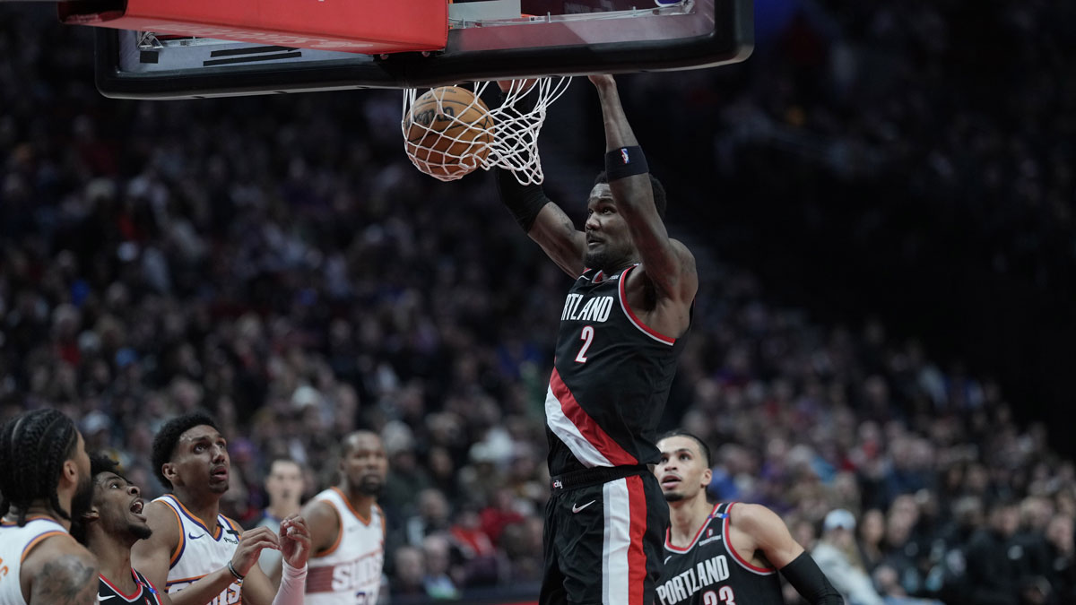 Blazers center Deandre Ayton (2) dunks the ball during the second half against the Phoenix Suns at Moda Center
