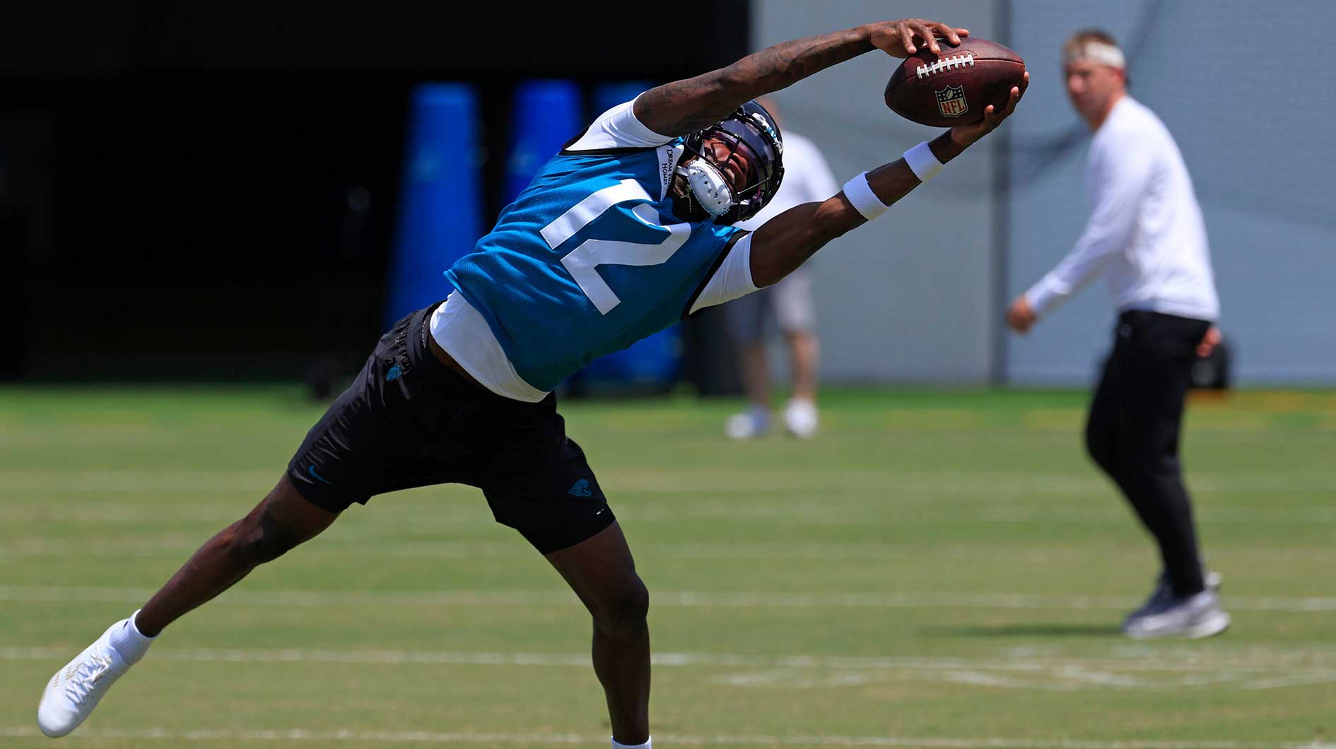 Jacksonville Jaguars wide receiver Travis Hunter (12) catches a pass during the first organized team activity at Miller Electric Center.