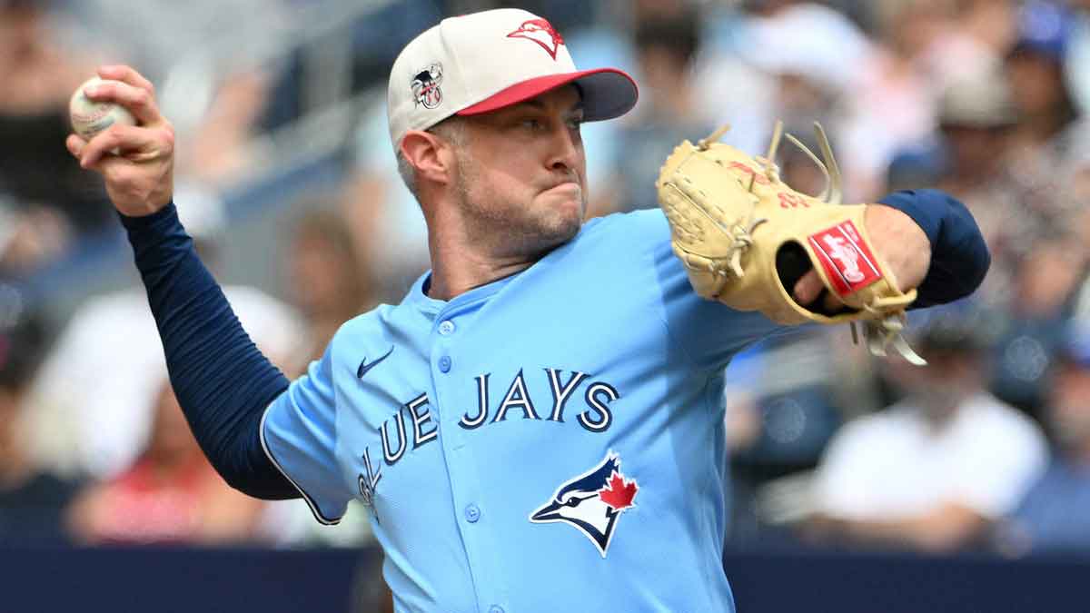 Jul 4, 2024; Toronto, Ontario, CAN; Toronto Blue Jays relief pitcher Trevor Richards (33) delivers a pitch against the Houston Astros in the seventh inning at Rogers Centre. Mandatory Credit: Dan Hamilton-Imagn Images