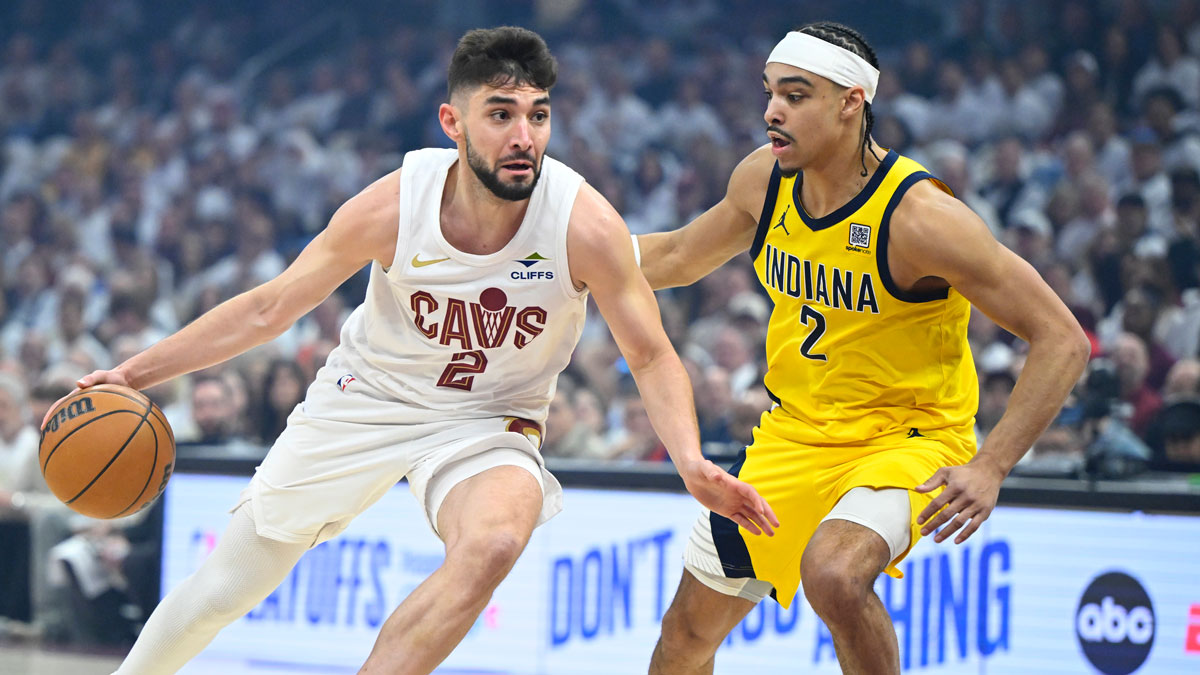 Cleveland Cavaliers guard Ty Jerome (2) dribbles beside Indiana Pacers guard Andrew Nembhard (2) in the first quarter during game two of the second round of the 2025 NBA Playoffs at Rocket Arena.