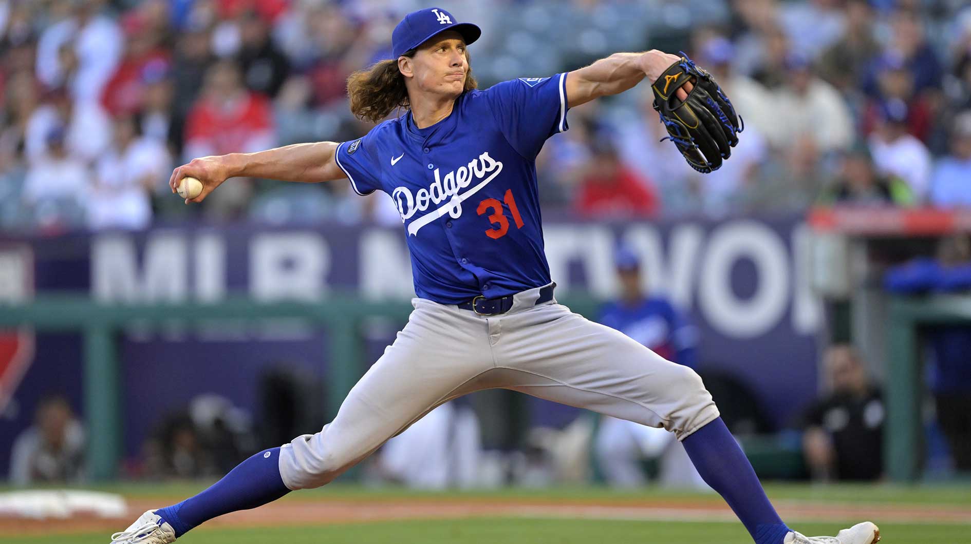 Los Angeles Dodgers starting pitcher Tyler Glasnow (31) delivers to the plate in the first inning against the Los Angeles Angels at Angel Stadium.