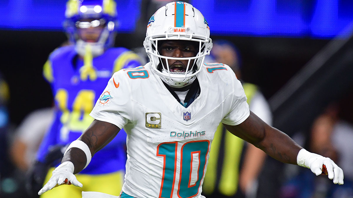 Miami Dolphins wide receiver Tyreek Hill (10) celebrates his touchdown scored against the Los Angeles Rams during the second half at SoFi Stadium.