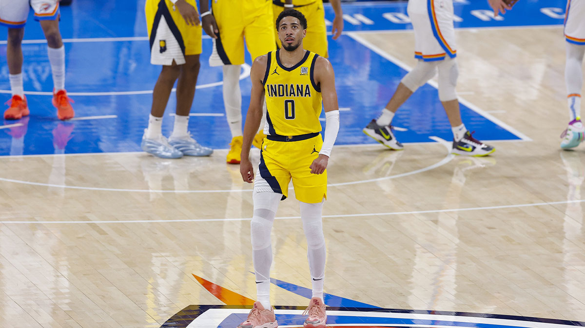 Indiana Pacers guard Tyrese Haliburton (0) walks back to the team bench in the first quarter against the Oklahoma City Thunder during game five of the 2025 NBA Finals at Paycom Center.