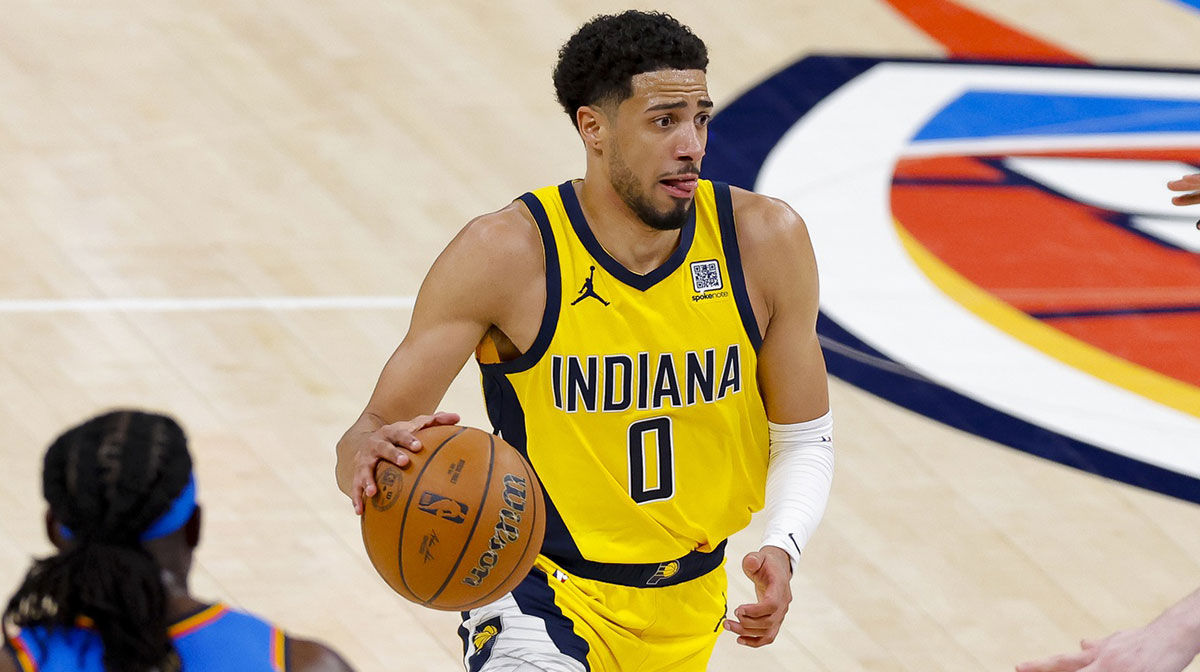 Indiana Pacers guard Tyrese Haliburton (0) brings the ball up court against the Oklahoma City Thunder during the third quarter of game two of the 2025 NBA Finals at Paycom Center.