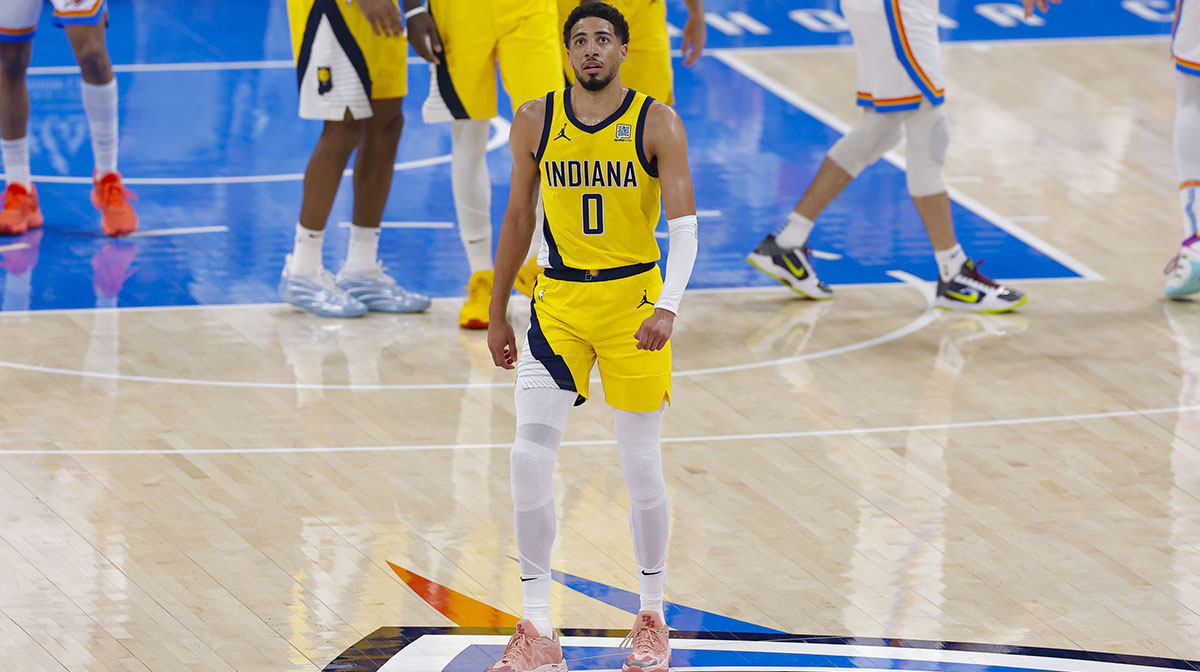 Indiana Pacers guard Tyrese Haliburton (0) walks back to the team bench in the first quarter against the Oklahoma City Thunder during game five of the 2025 NBA Finals at Paycom Center.