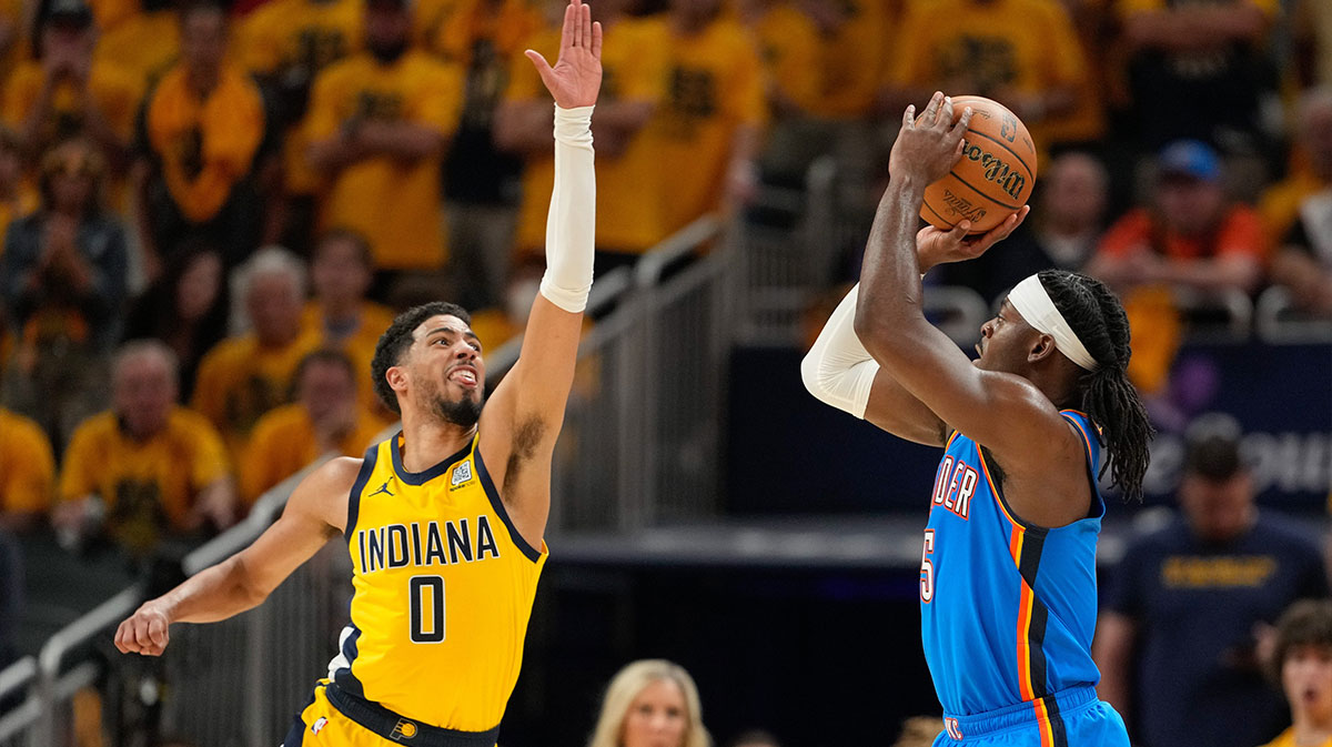 Indiana Pacers guard Tyrese Haliburton (0) defends against a shot by Oklahoma City Thunder guard Luguentz Dort (5) in the third quarter during game six of the 2025 NBA Finals at Gainbridge Fieldhouse.