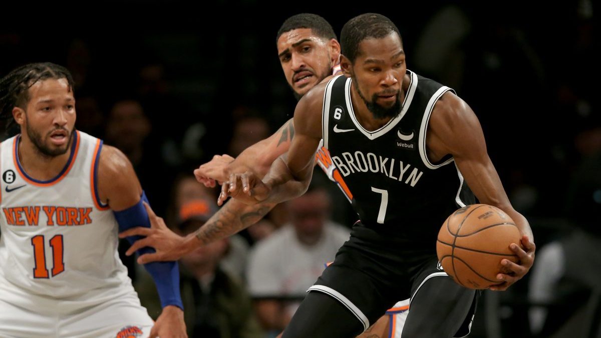 Brooklyn Nets forward Kevin Durant (7) controls the ball against New York Knicks guard Jalen Brunson (11) and forward Obi Toppin (1) during the second quarter at Barclays Center.