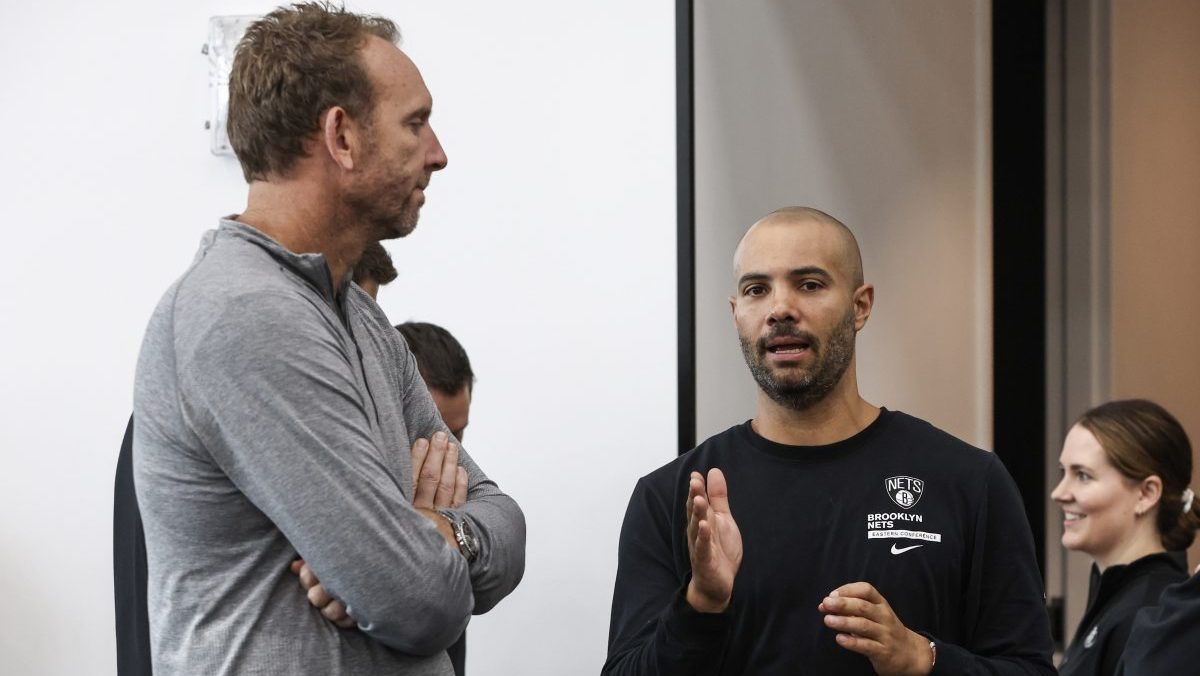 Brooklyn Nets General Manager Sean Marks (left) speaks to head coach Jordi Fernandez (right) during media day at HSS Training Center.