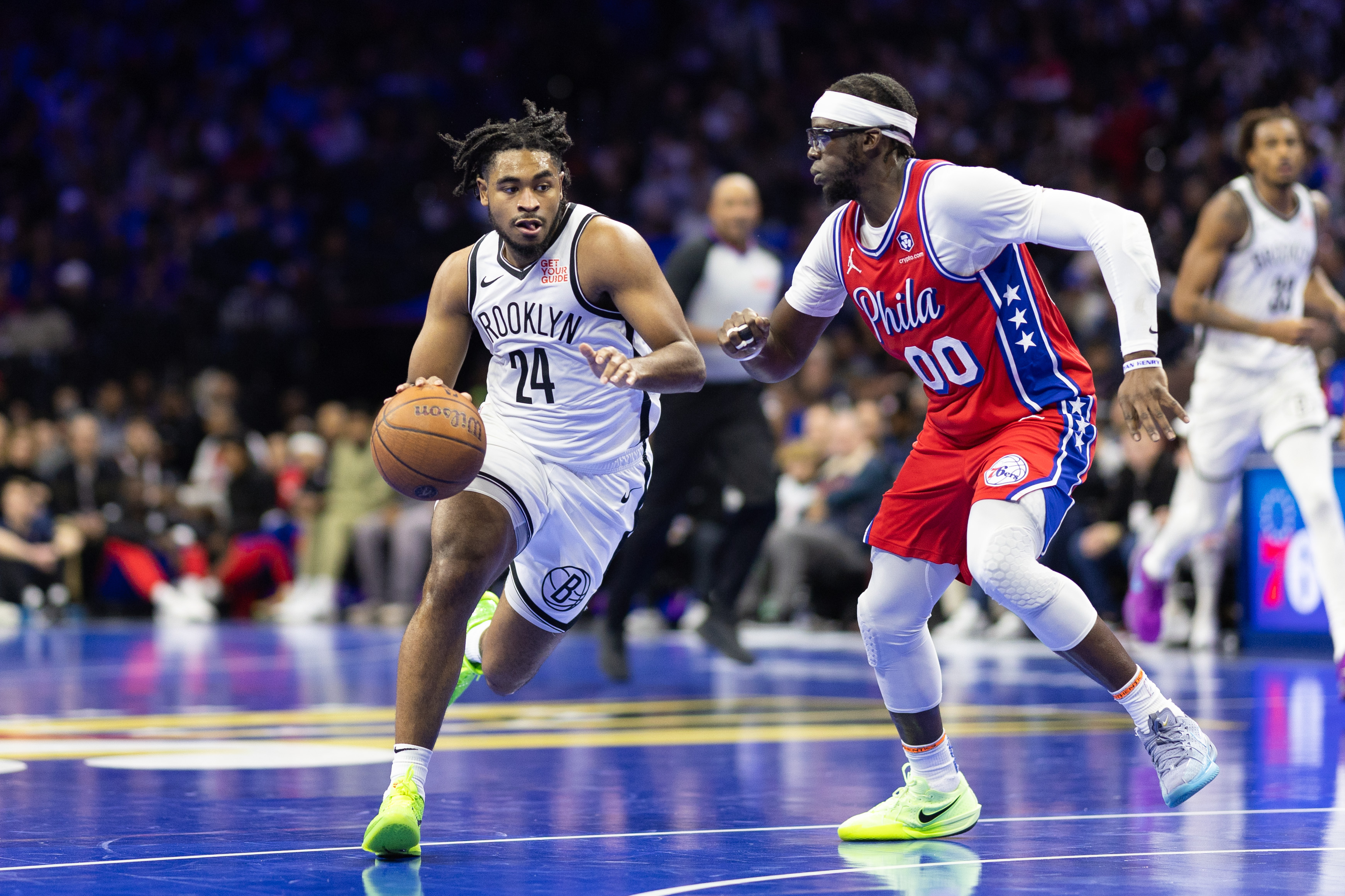 Brooklyn Nets guard Cam Thomas (24) drives against Philadelphia 76ers guard Reggie Jackson (00) during the second quarter at Wells Fargo Center.