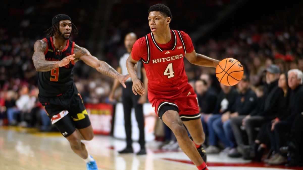 Rutgers Scarlet Knights guard Ace Bailey (4) drives to the basket against Maryland Terrapins guard Selton Miguel (9) during the first half at Xfinity Center.