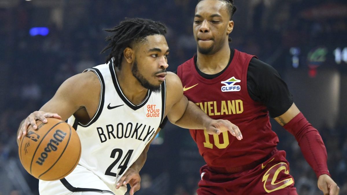 Mar 11, 2025; Cleveland, Ohio, USA; Brooklyn Nets guard Cam Thomas (24) dribbles beside Cleveland Cavaliers guard Darius Garland (10) in the first quarter at Rocket Arena. Mandatory Credit: David Richard-Imagn Images