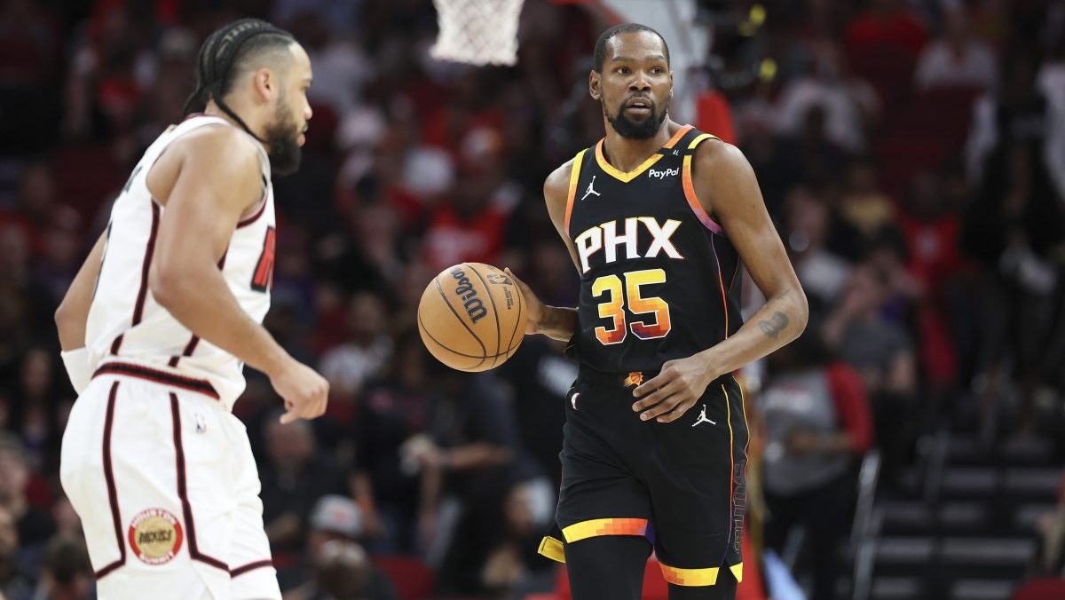 Phoenix Suns forward Kevin Durant (35) brings the ball up the court during the first quarter against the Houston Rockets at Toyota Center.