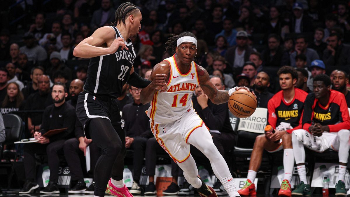 Atlanta Hawks guard Terance Mann (14) goes to the basket as Brooklyn Nets forward Jalen Wilson (22) during the first half at Barclays Center.