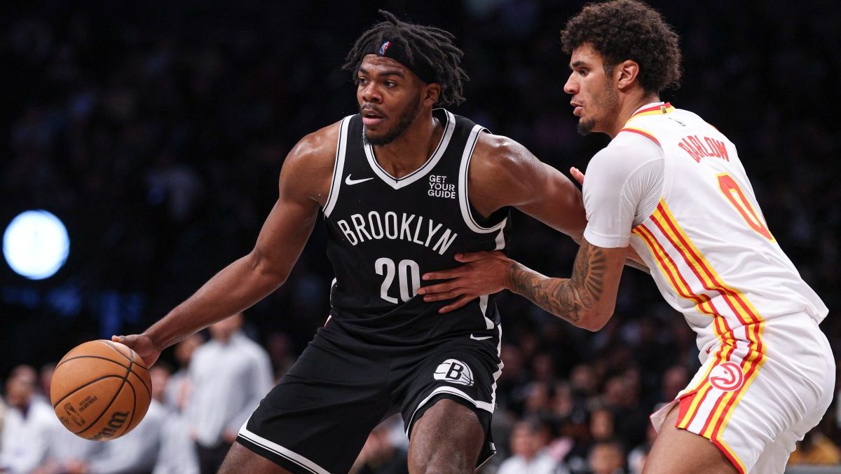 Brooklyn Nets center Day'Ron Sharpe (20) is defended by Atlanta Hawks forward Dominick Barlow (0) during the second half at Barclays Center.