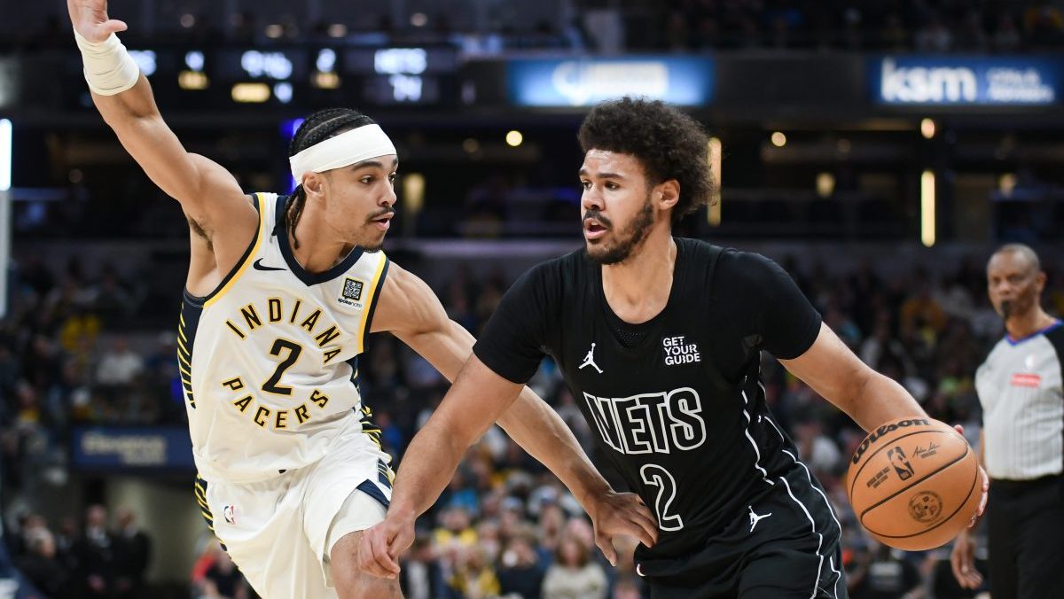 Brooklyn Nets forward Cameron Johnson (2) goes to the basket against Indiana Pacers guard Andrew Nembhard (2) during the second half at Gainbridge Fieldhouse.