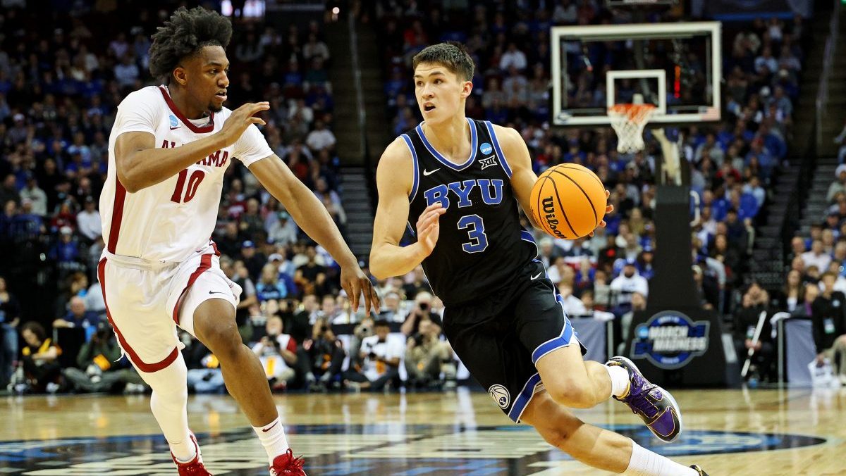 Brigham Young Cougars guard Egor Demin (3) drives to the basket against Alabama Crimson Tide forward Mouhamed Dioubate (10) during the first half during an East Regional semifinal of the 2025 NCAA tournament at Prudential Center.