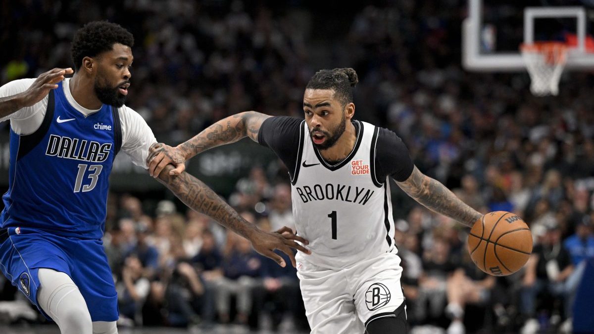 Brooklyn Nets guard D'Angelo Russell (1) drives to the basket past Dallas Mavericks forward Naji Marshall (13) during the second half at the American Airlines Center.