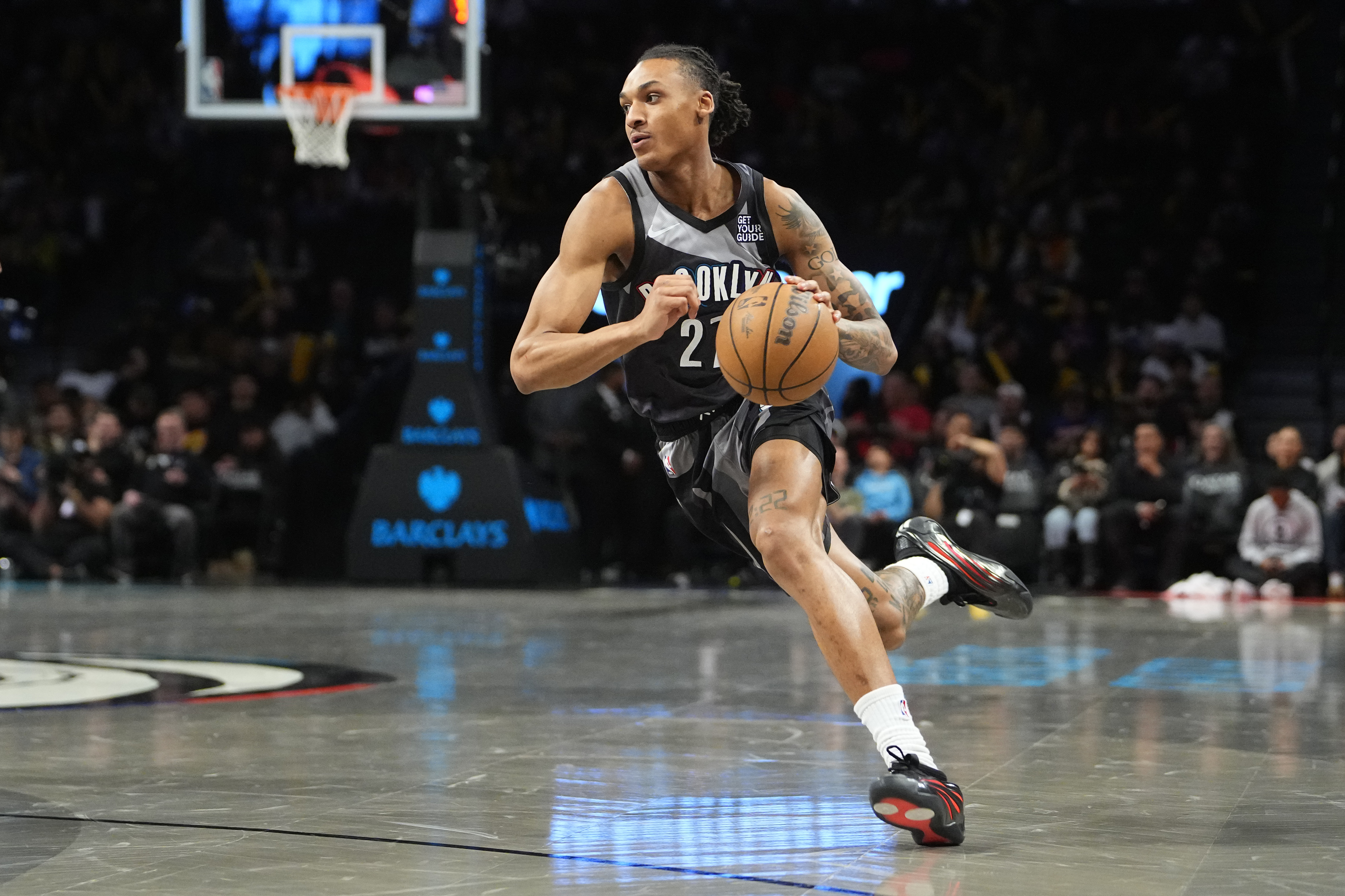 Brooklyn Nets forward Maxwell Lewis (27) dribbles the ball against the Toronto Raptors during the second half at Barclays Center.