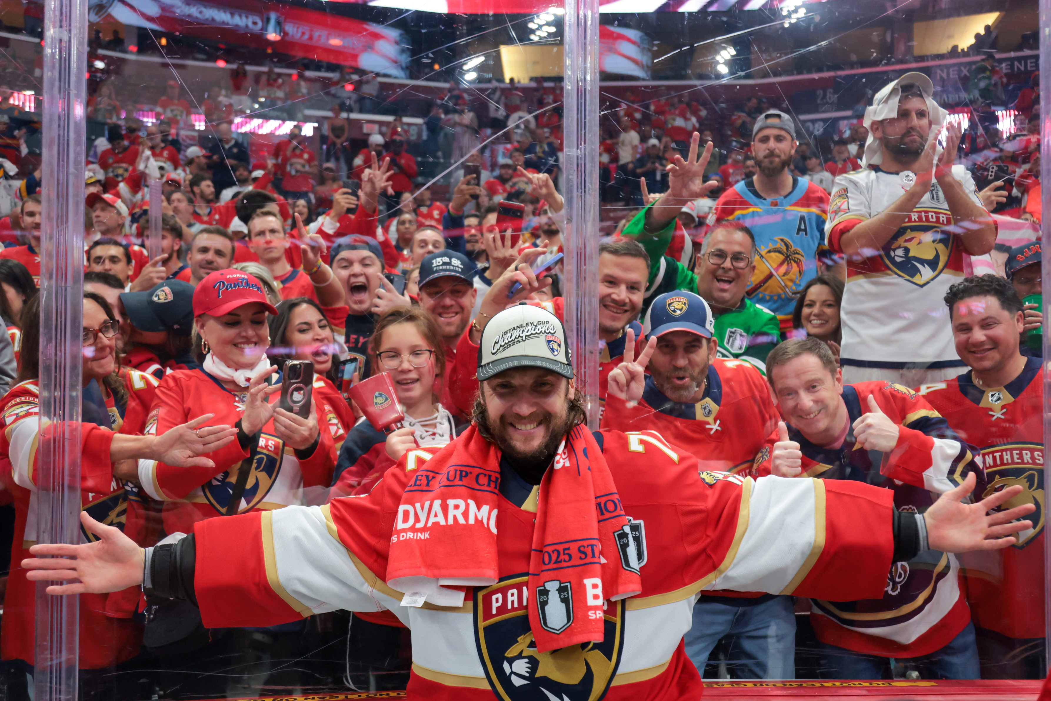 Florida Panthers goaltender Sergei Bobrovsky (72) poses for a photo with fans after winning game six of the 2025 Stanley Cup Final against the Edmonton Oilers at Amerant Bank Arena.