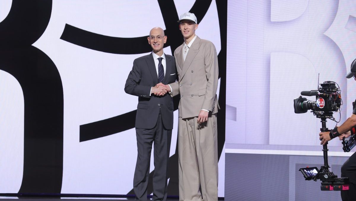 Egor Demin stands with NBA commissioner Adam Silver after being selected as the eighth pick by the Brooklyn Nets in the first round of the 2025 NBA Draft at Barclays Center.