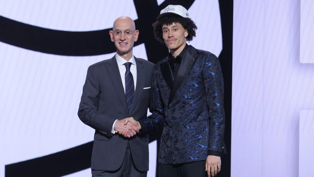 Jun 25, 2025; Brooklyn, NY, USA; Nolan Traore stands with NBA commissioner Adam Silver after being selected as the 19th pick by the Brooklyn Nets in the first round of the 2025 NBA Draft at Barclays Center. Mandatory Credit: Brad Penner-Imagn Images