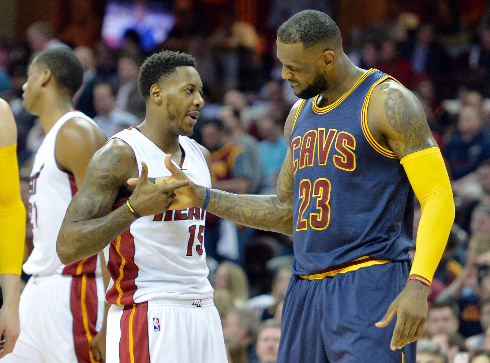 Cleveland Cavaliers forward LeBron James (23) shakes hands with Miami Heat guard Mario Chalmers (15) in the first quarter at Quicken Loans Arena.