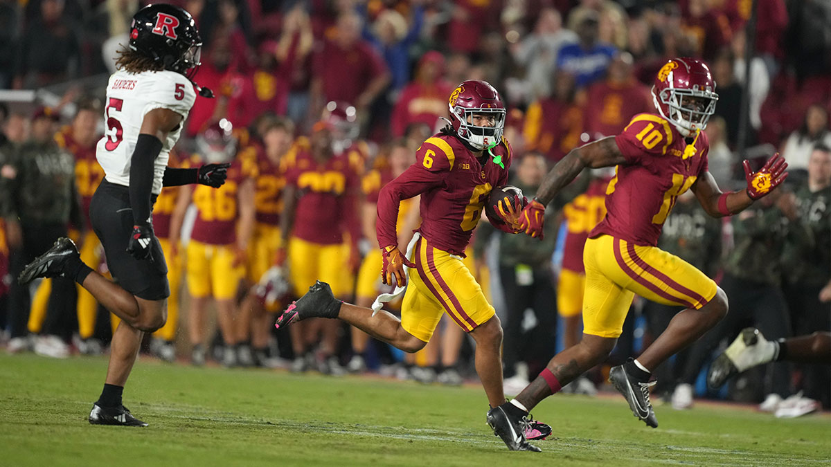Southern California Trojans wide receiver Makai Lemon (6) carries the ball on a 70-yard reception against the Rutgers Scarlet Knights in the second half at United Airlines Field at Los Angeles Memorial Coliseum. Mandatory Credit: Kirby Lee-Imagn Images