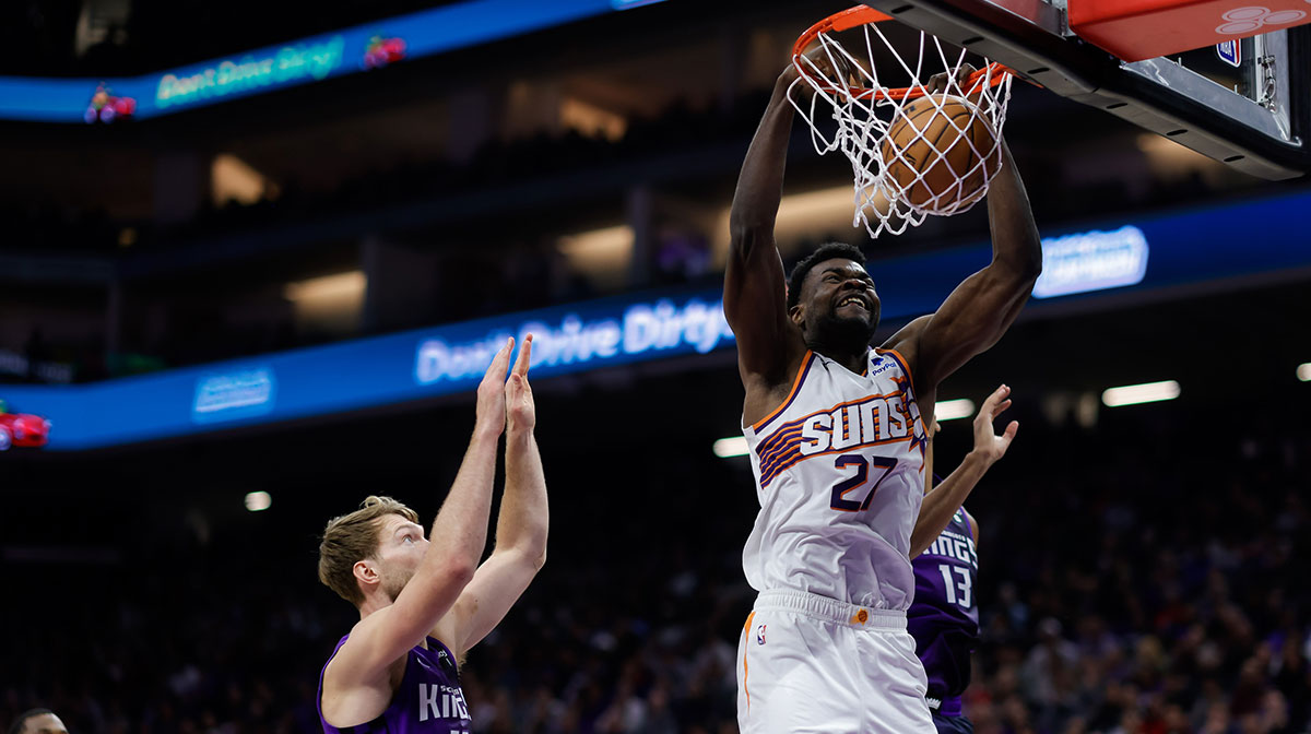 Phoenix Suns center Udoka Azubuike (27) dunks the ball against Sacramento Kings forward Domantas Sabonis (10) during the second quarter at Golden 1 Center. 