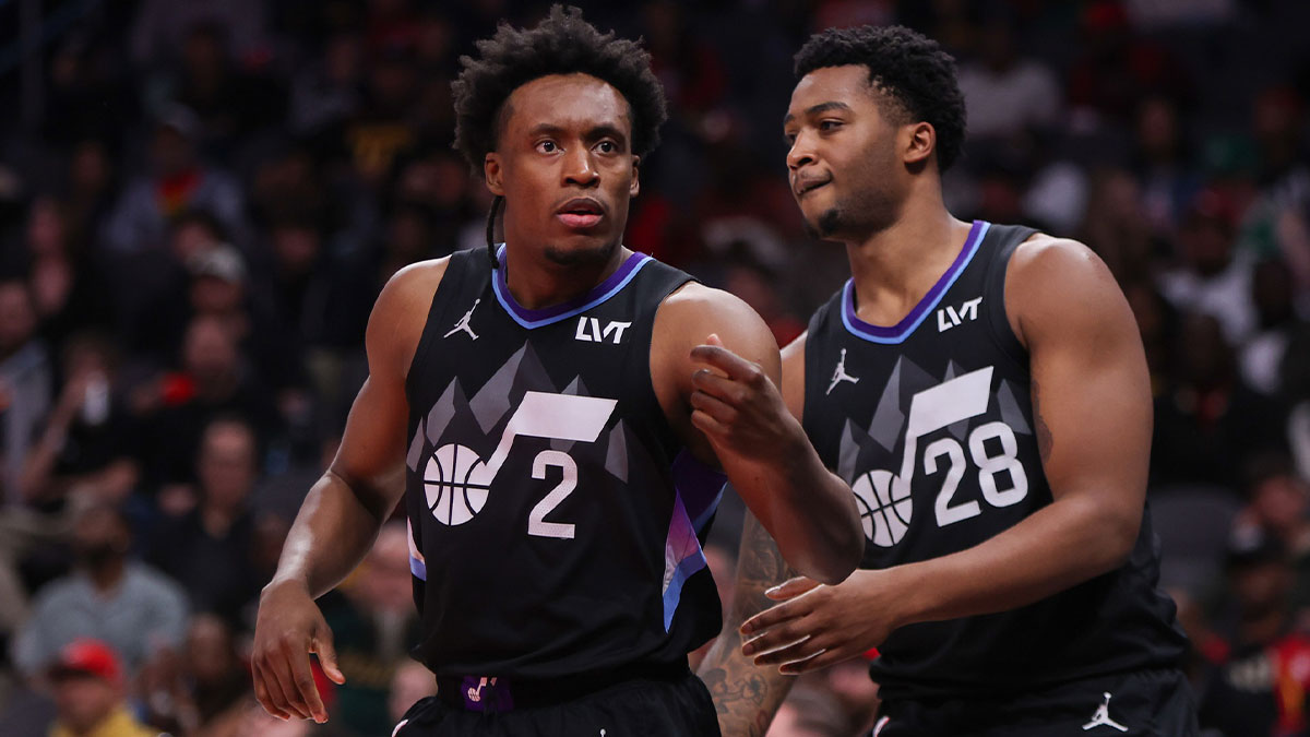 Utah Jazz guard Collin Sexton (2) reacts after a basket with forward Brice Sensabaugh (28) against the Atlanta Hawks in the third quarter at State Farm Arena.
