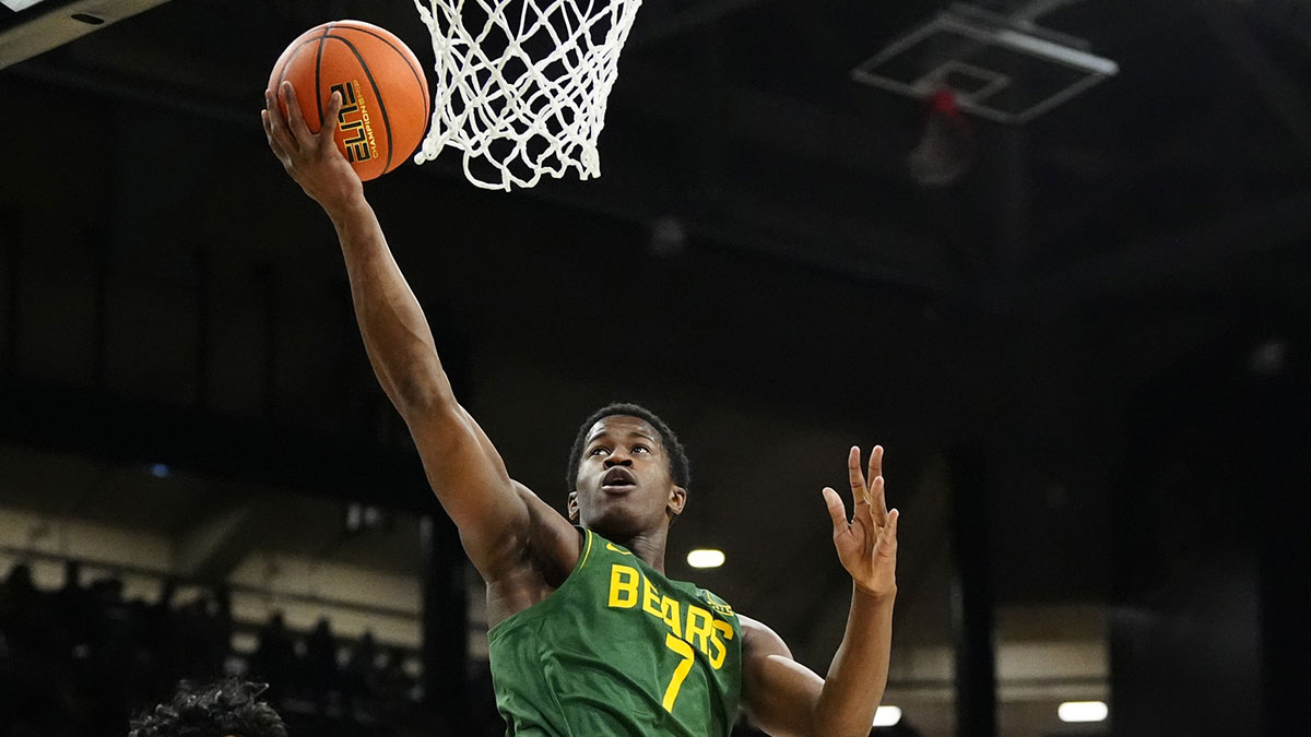 Baylor Bears guard VJ Edgecombe (7) shoots the ball in the first half against the Colorado Buffaloes at the CU Events Center.
