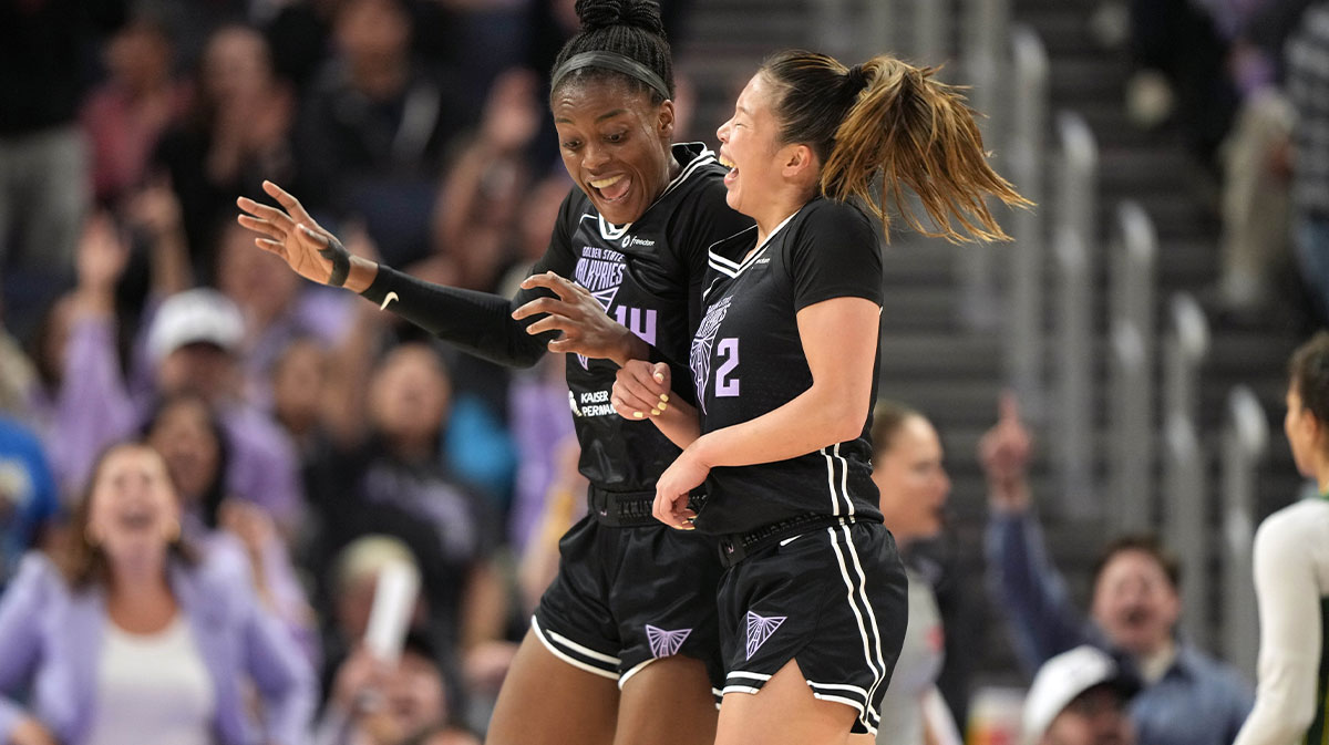 Golden State Valkyries center Temi Fagbenle (left) celebrates with guard Kaitlyn Chen (2) after scoring against the Seattle Storm during the third quarter at Chase Center.
