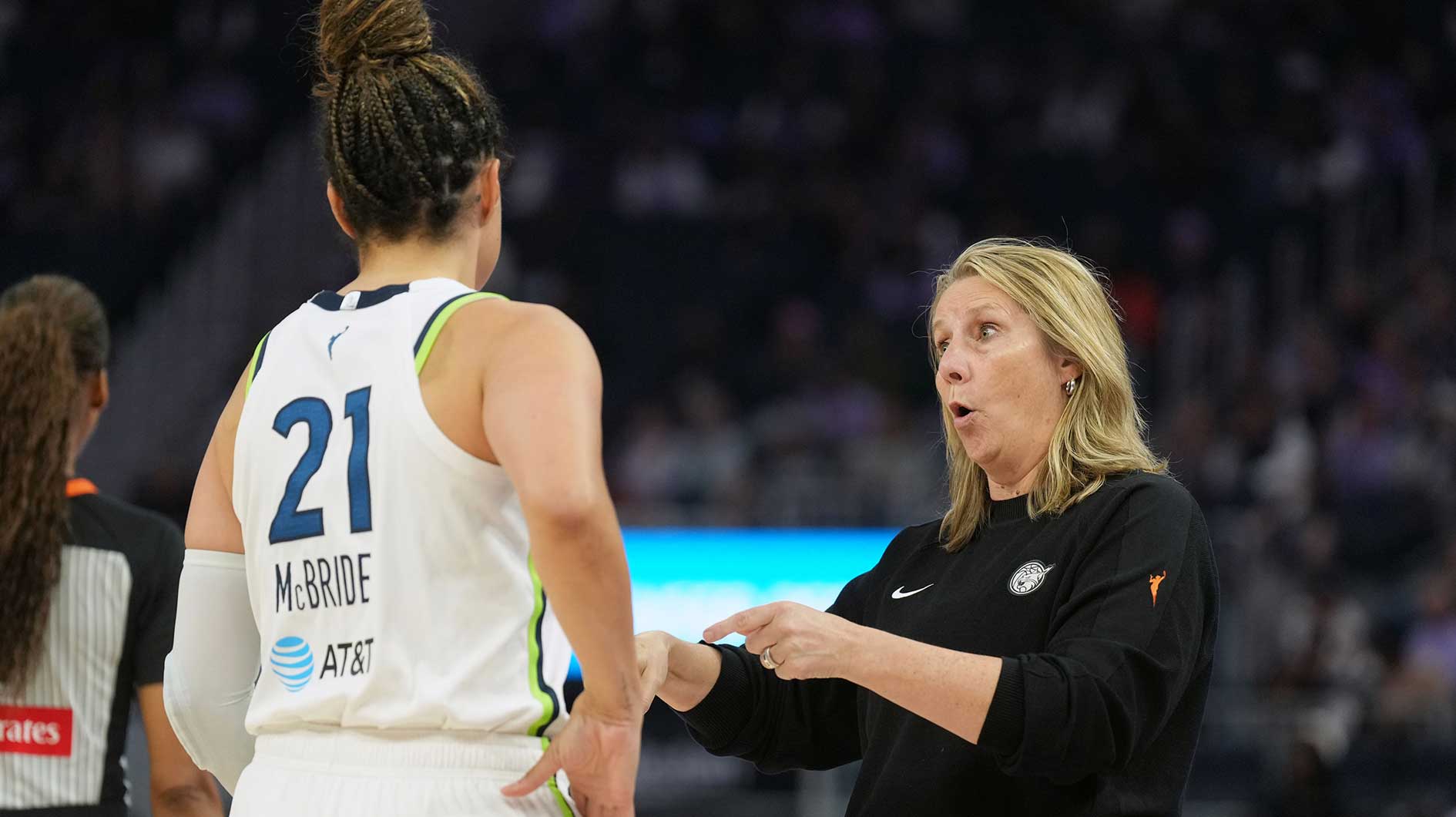 Minnesota Lynx head coach Cheryl Reeve (right) talks with guard Kayla McBride (21) during the first quarter against the Golden State Valkyries at Chase Center.