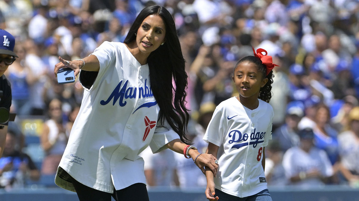 Kobe Bryant's wife Vanessa, who denied pregnancy rumors with Rihanna posts on Instagram after speculation surfaced that she was pregnant, and Bianka Bryant throwing the first pitch before Los Angeles Dodgers game against the Tampa Bay Rays.