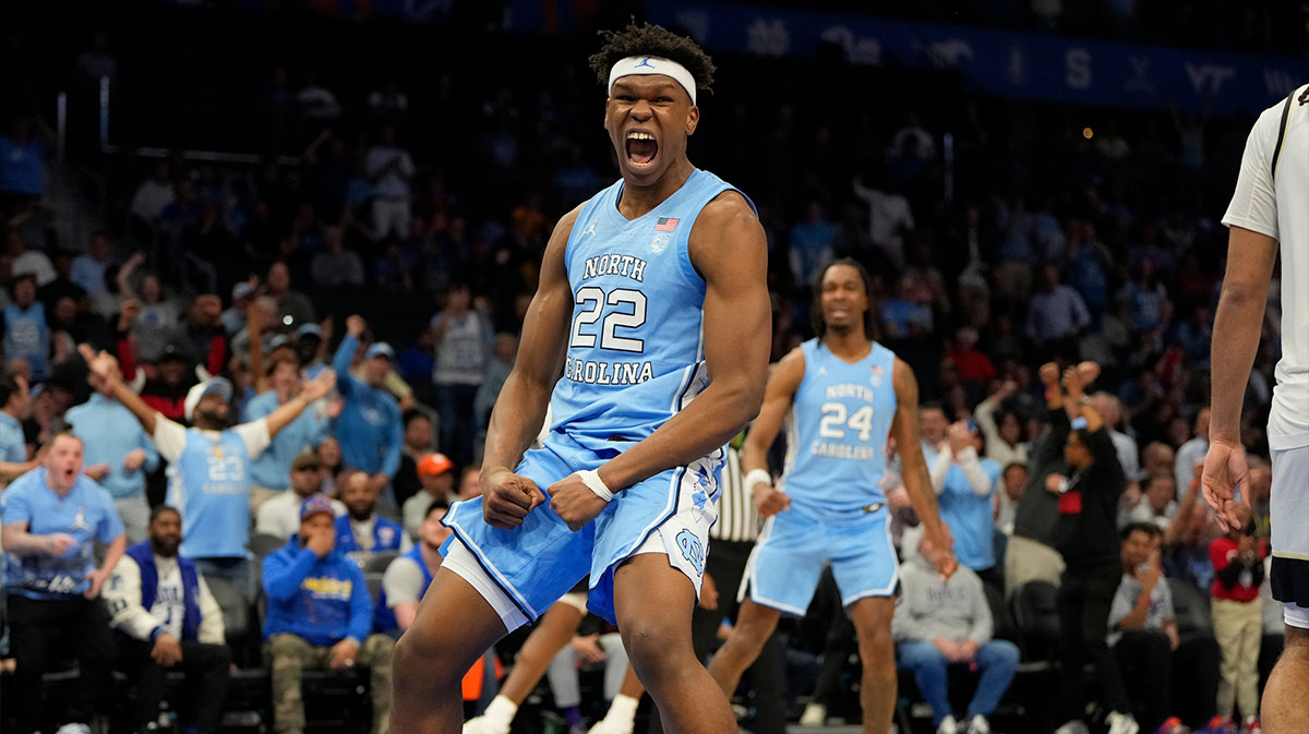 North Carolina Tar Heels forward, now of NC State basketball, Ven-Allen Lubin (22) reacts after scoring late in the second half at Spectrum Center.
