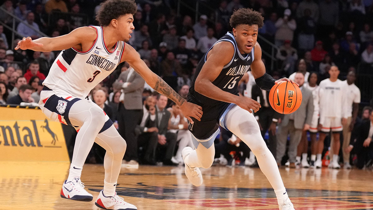 Villanova Wildcats guard Jordan Longino (15) drives on Connecticut Huskies forward Jaylin Stewart (3) during the second half at Madison Square Garden.