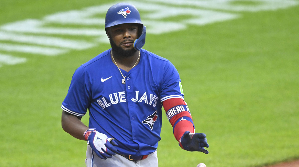 Toronto Blue Jays first baseman Vladimir Guerrero Jr. (27) tosses his bat after walking in the sixth inning against the Cleveland Guardians at Progressive Field.